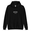 Black hoodie with 'MUM EST. 2023' text on a white background